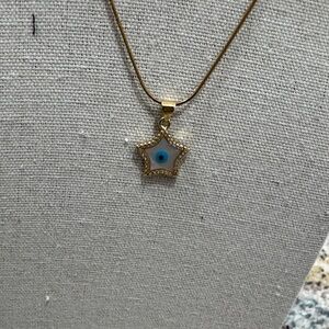 Gold Star Pendant Necklace with Blue Accent